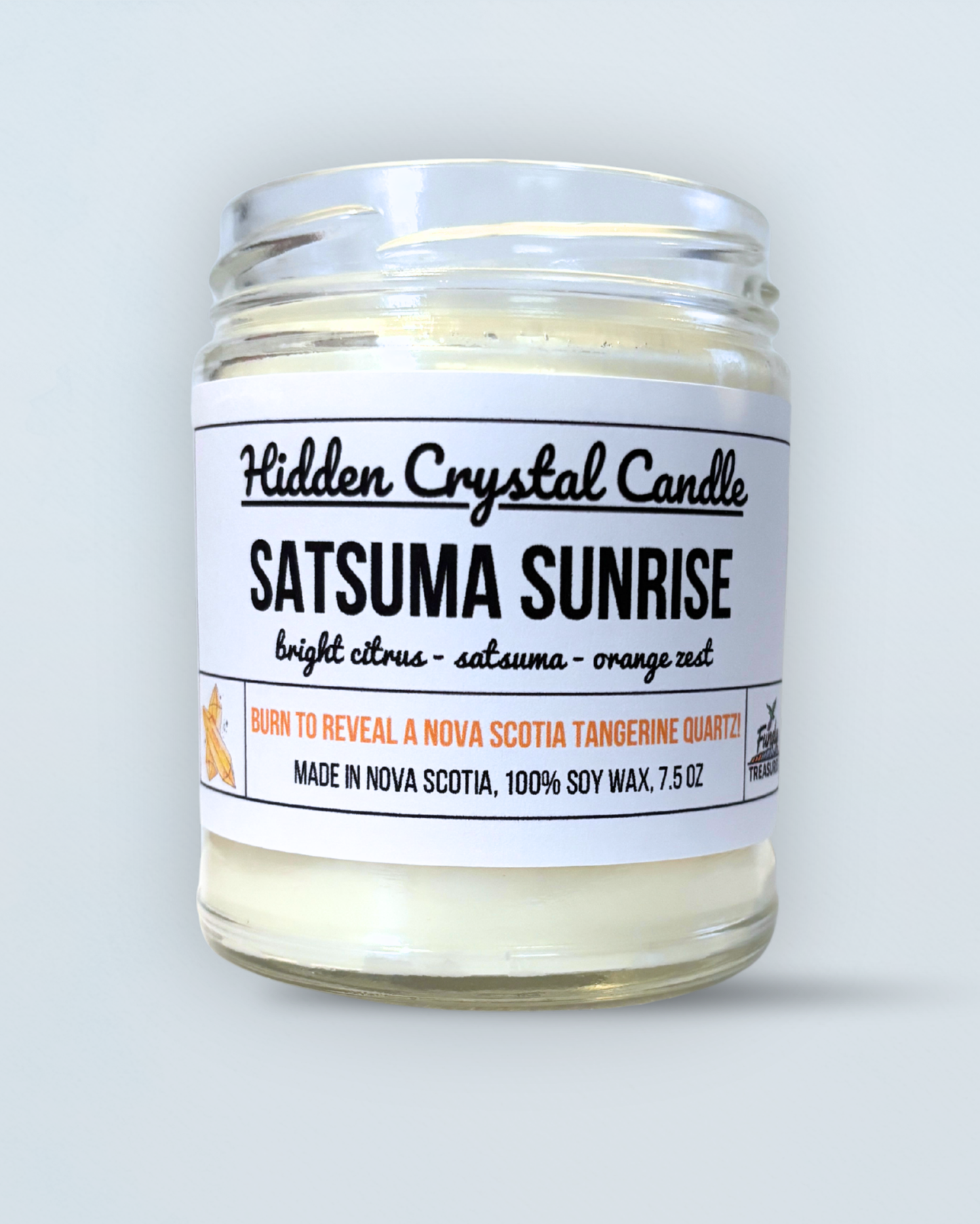 Handmade candle with hidden Nova Scotia tangerine quartz crystal